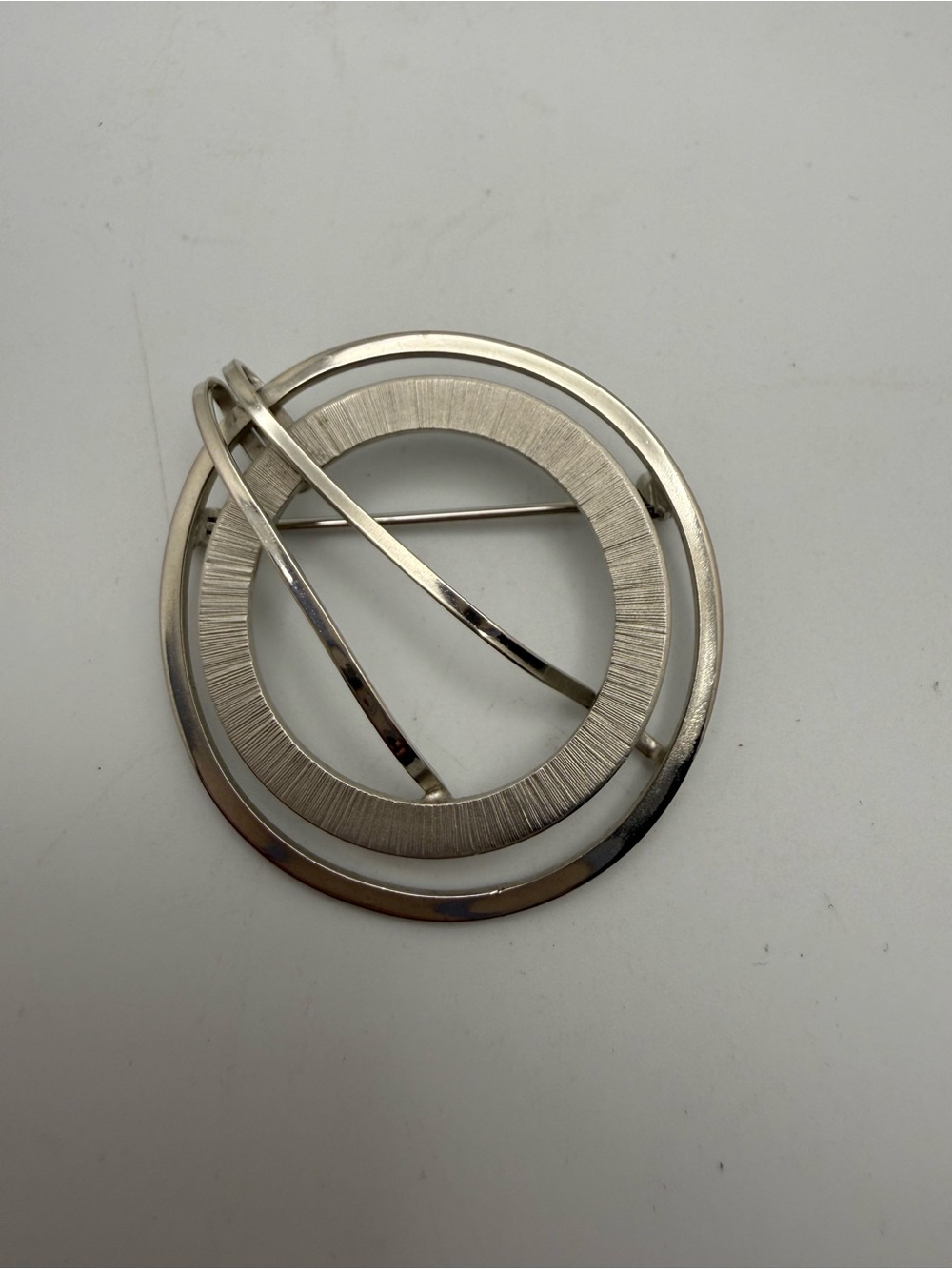 Vintage Giovanni Silver-Tone Circular Pin Brooch - Elegant Modern Design